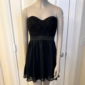 Material Girl black corset strapless dress